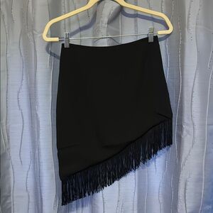 Asymmetrical fringe mini skirt